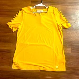 This is a yellow Michael Kors top original price 68 sale price five dollars